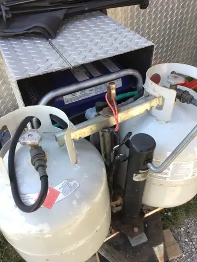 Hawk trailer , fits two bikes in rear, fridge stove ,shower, toilet ,queen bed