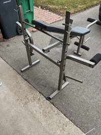 Trainor sport bench with leg developer weight in good condition