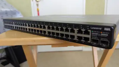 Cisco Linksys 48-port 10/100 + 4-port Gigabit Switch, View more