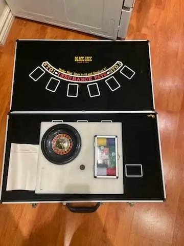 Approx. 17”x30” Suitcase Poker Game Set. $10 OBO Includes: -Texas Hold ‘em -Blackjack -Roulette -Cra...