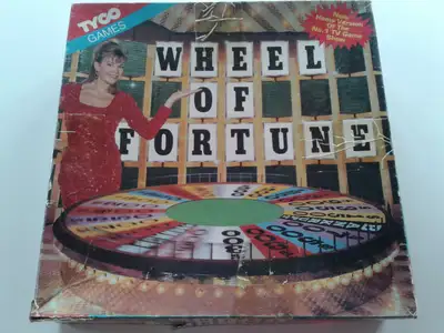 Wheel of fortune Tyco 1992 board game. Includes all 50 puzzle sheets. As shown. Missing stop arrow f...