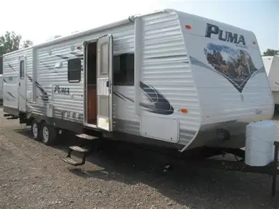 Sleeps up to 10 people, includes 3 bunk beds in the back. Comes with 2 slide outs with awning tops,...