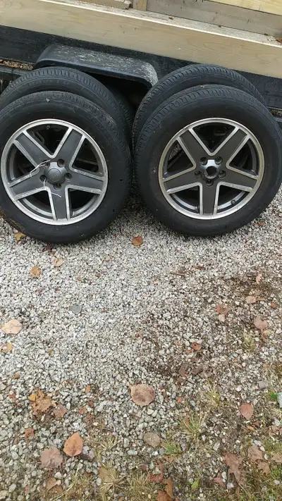 17 inch RIMS off 2009 JEEP PARTROIT Tires mostly worn-out 200 $