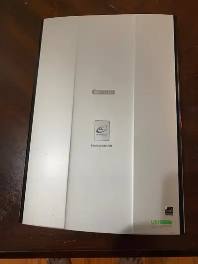 Cannon portable scanner powered by USB. Driver CD included. Asking for $35