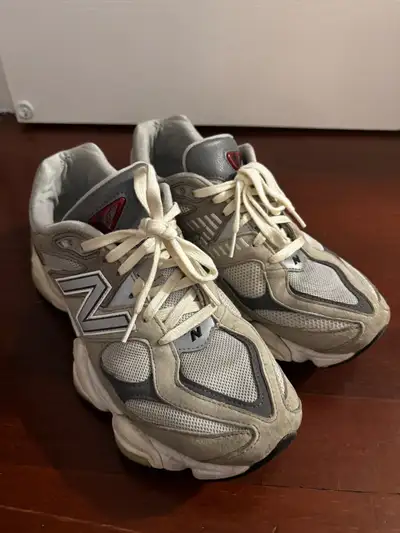 Step up your sneaker game with these gently worn New Balance 9060 Grey running shoes, perfect for ad...