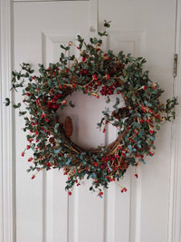Door / wall wreath with faux leaves, pinecones and red berries 