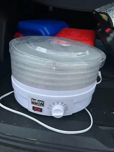 Used a couple of times, has a slight crack on the lid, but works perfectly fine.