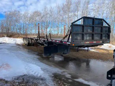 2014 tri-axle flat deck trailer . Sell or trade for a cross gate belly dump gravel trailer