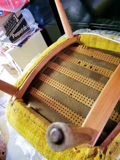 Two matching chairs- solid wood frame. Sides are curved