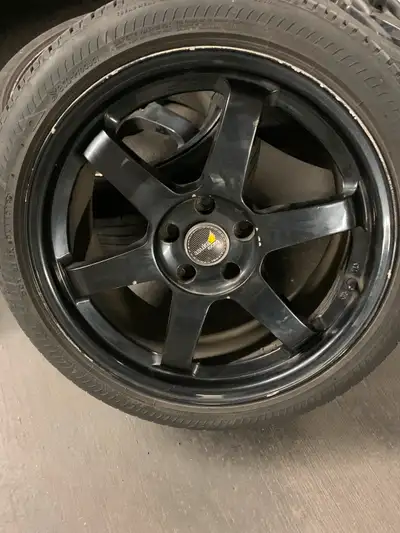 4 ASUKA ALUMINUM RIMS WITH 245 40R18 CONTINENTAL AND BRIDGESTONE TIRES. In good condition.