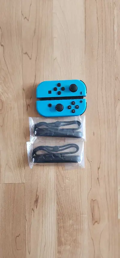Like-new Nintendo Switch Neon Blue Joy-Cons Include wrist straps
