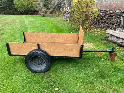 Small utility trailer for sale.Great for yard work or light woods work. Tow behind lawnmower or ATV.