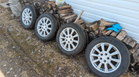 Full set of 235/55R17 Bridgestone Tires mounted on Aluminum rims
