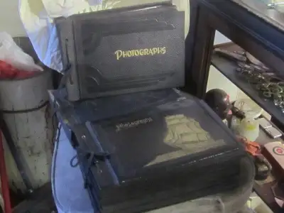 Selling quickly at $10.00 each...empty.....b/w photos have been removed.......they are 7 1/4" x 11"...