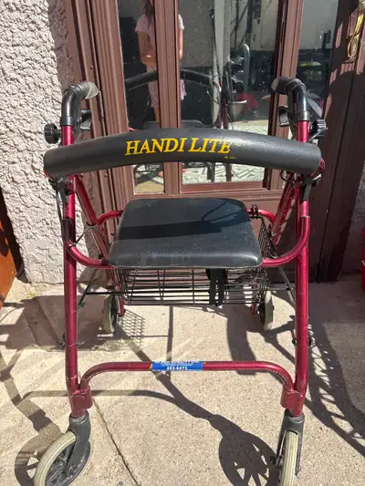 This Handi Lite rolling walker provides reliable mobility support, featuring a sturdy frame, comfort...