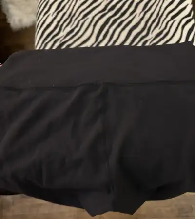 These are a pair of black Lululemon athletic pants, size 8. These pants are in good condition, perfe...