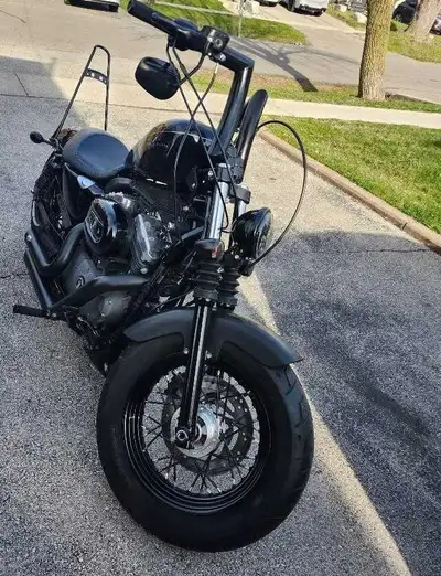 2010 Nightster 48 Wide tire setup, LA Choppers upper triple tree,Black wide front spoked wheel, 12"...