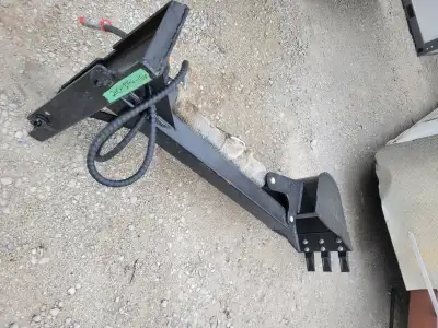 Selling a GIYI Backhoe Attachment for Mini Skid Steer.