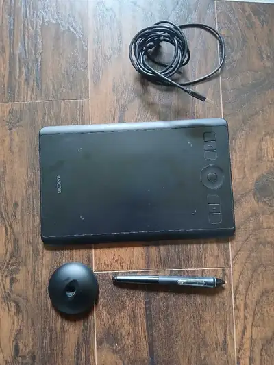 Wacom Intuos Pro PTH-460. Bought new and used for about a year before I got a tablet. Perfect workin...