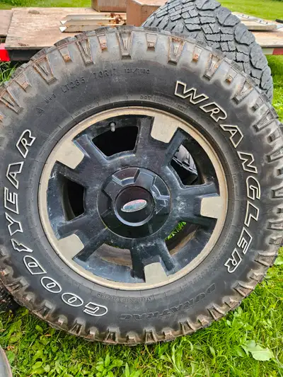 17 inch ford wheels for sale tires aren't much but probably get through the summer 285/70/17 came of...