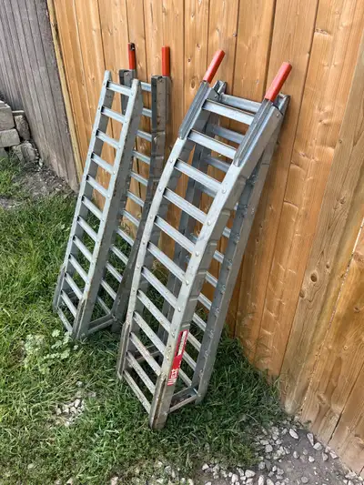 Good condition ramps I’ve used a few times to load up a riding lawnmower and atv’s no issues. No ben...