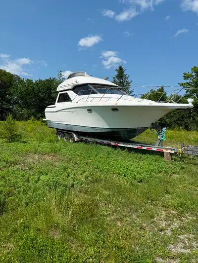 32 ft, no engines only out drives , trailer included