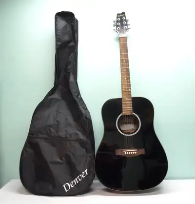 Offered for sale is this high quality acoustic guitar by Denver. The model number is D44S-BLK. And a...