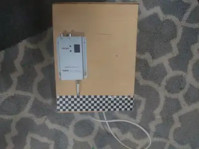 Already mounted on a box that can be mounted on a tripod. Comes with receiver. 140$, will not ship u...