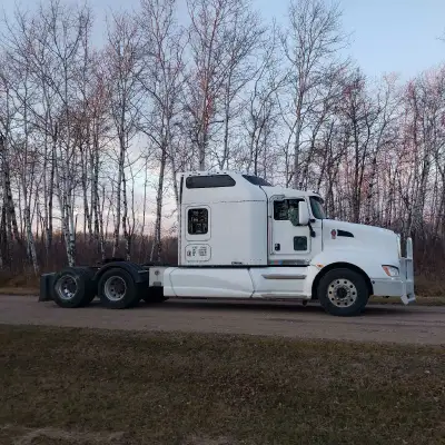 Parting out 2011 Kenworth T660. Cab, Hood, ISX Engine, 18 speed Manual Transmission, Rear Clip 3.73...