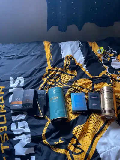 I am selling all of these for 900 they all been opend but have lots of cologne in them except the li...