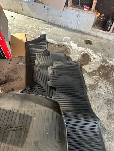 These are Honda Odyssey floor mats from a used vehicle. They are in good condition and ready for a n...