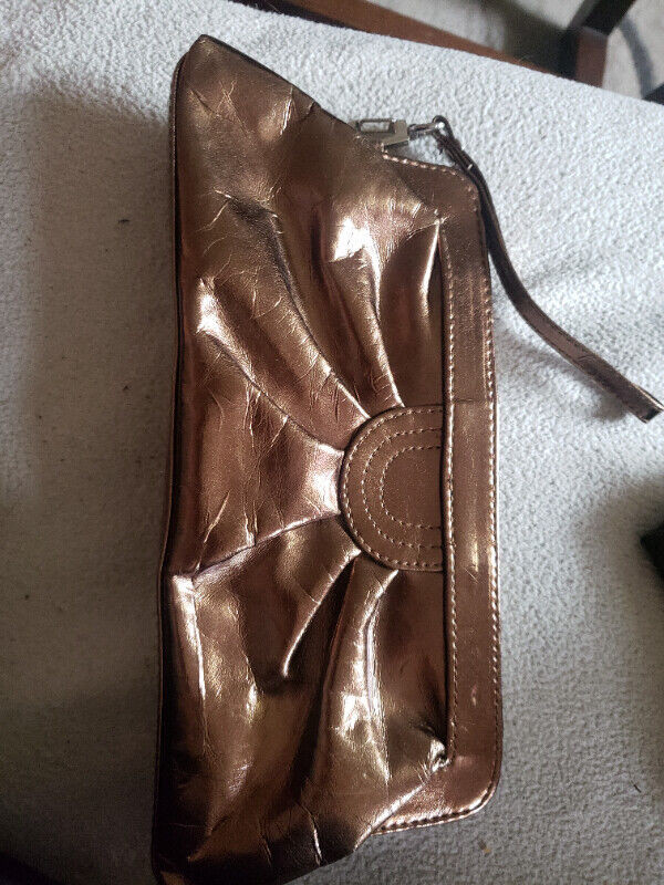 gold aldo clutch. Used once in Jewellery & Watches in City of Halifax