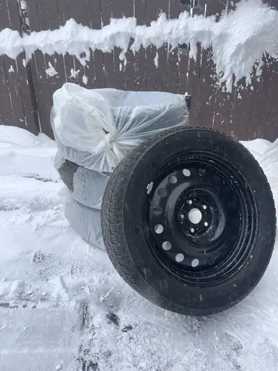 Good condition Michelin X Ice snow tires mounted and balanced on brand new steel rims. This was on a...