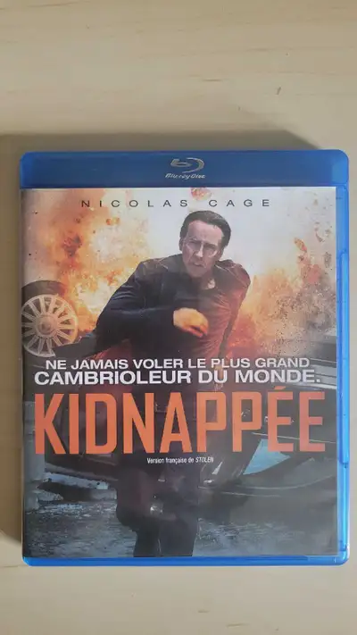 Stolen / Kidnappée Blu-ray - Nicolas Cage Possède quelques grafignes ( Non testé ) Aucun shipping Ar...