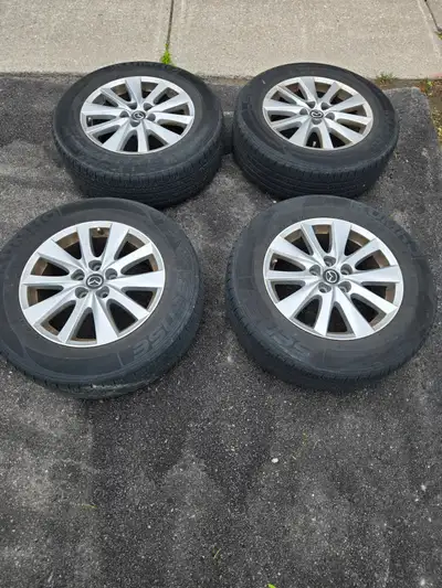 - good condition Kumho Sense all season tires 225/65R17 on OEM Mazda rims, DOT code 0821, came off o...