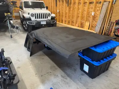 Used but New Condition- recently taken off of a 2019 Jeep Wrangler- Black Soft Top.