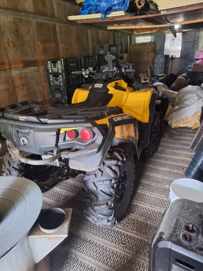 Quad is like new 10 000 please text 519-983-4596