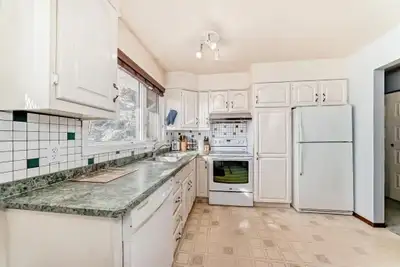 Spacious home with huge fenced yard on quiet street (Rundle)