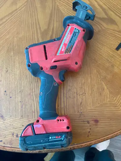 Milwaukee hackzall reciprocating saw with battery costs 178.00 comes with a m18 battery pack