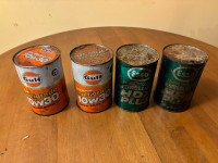 Vintage oil cans and plastic oil jugs 