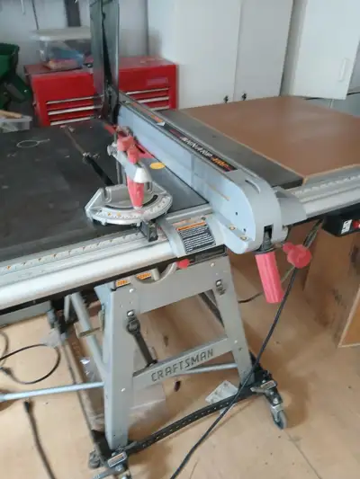 Craftsman 10 inch Professional series TABLE SAW. In Excellent condition. On Craftsman Stand and a wh...
