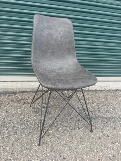 Enhance your dining space with this set of seven stylish dining table chairs, each featuring a sleek...