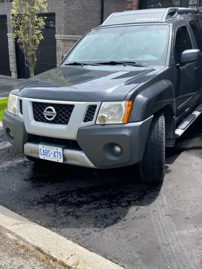 I'm selling my 2012 Nissan Xterra SV 4x4, a reliable SUV known for its off-road capabilities and rug...