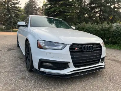 Inter-cooled Supercharger premium V-6 344 HP All-Wheel Drive Added Diffuser, Front lip, Trunk spoile...