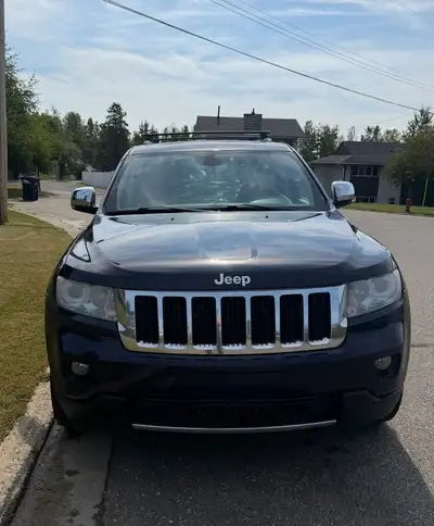 2012 Jeep Grand Cherokee Limited If you’re looking for a great adventure vehicle or very comfortable...