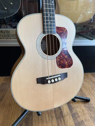 We chose a solid Sitka spruce top and arched flamed maple back to mirror the tone woods that have be...