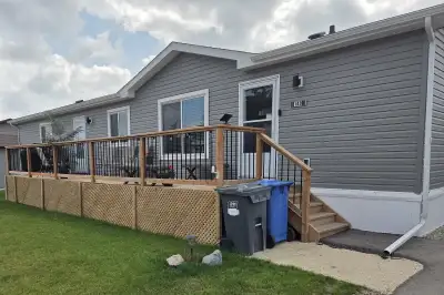 MUST SEE OPEN HOUSE SUNDAY 1:00 TO 4:00 140-2695 Main Street How to downsize your cost, but not your...