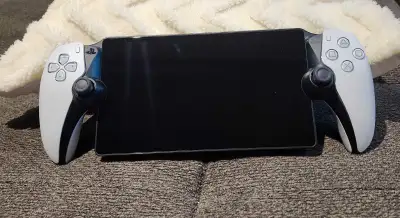 Playstation Portal- 200 dollars like new no scratches has screen protector since day one used couple...