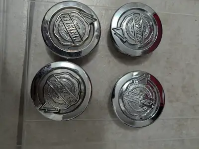 Price 10$ each or 30$ for the set of 4 Chrysler Hub caps PT Cruiser, Pacifica, Sebring, Town & Count...