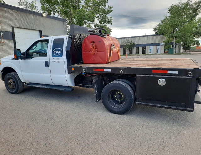 2012 F350 Dually ext cab Flat Deck (RETIREMENT SALE) in Cars & Trucks in Calgary - Image 3